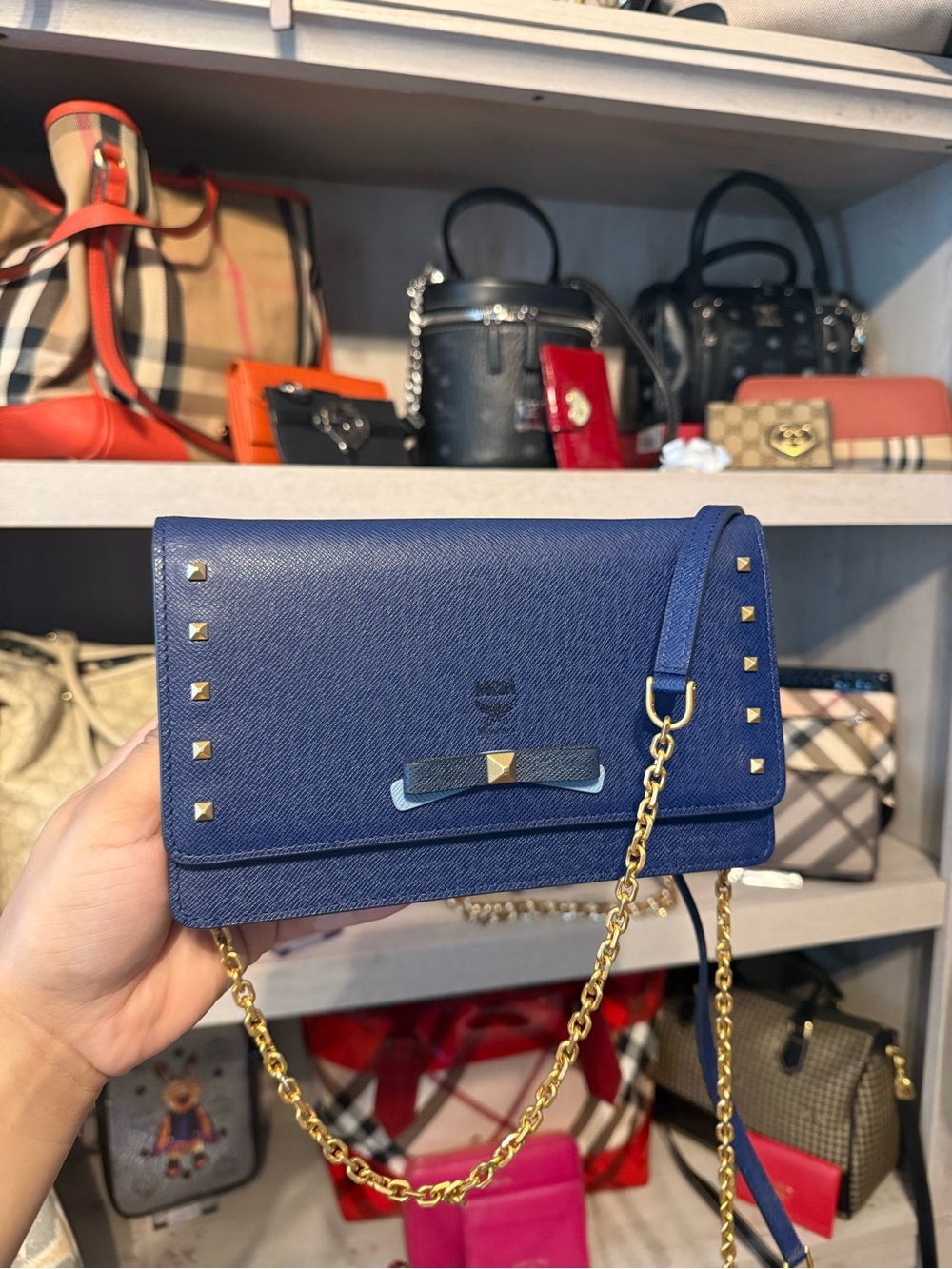 MCM Studded Bow Clutch on chain